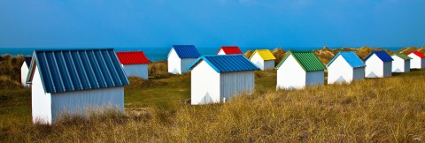 Photo Beach huts in Gouville-sur-Mer, Normandy par Philip Plisson
